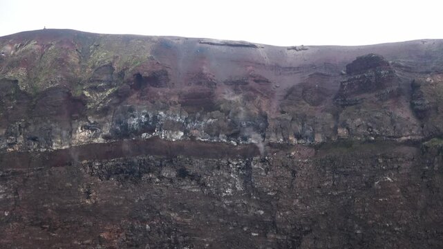 Smoking fumaroles inside the Vesuvius volcano crater