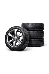 Obraz premium Stack of four new car tires with silver rims, ready for automotive needs.