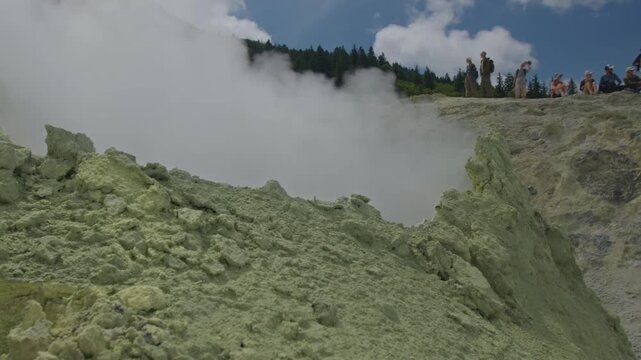 Fumaroles field. Vents smoke on the volcanic active area of volcano of Mendeleev on Kunashir Island, Russia