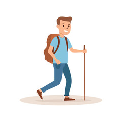Fototapeta premium A man hiking with a backpack and a stick, traversing a trail