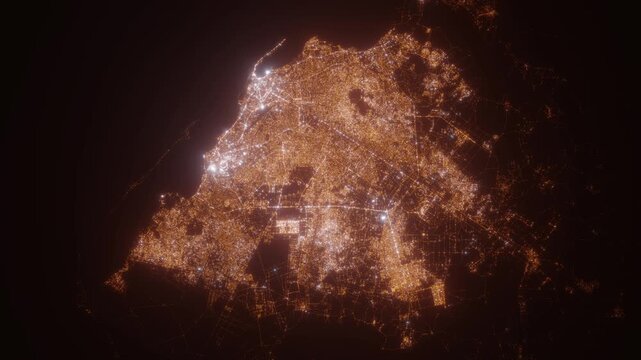 Luanda (Angola) aerial view at night. Satellite view on modern city with street lights. Camera is flying above the city, moving forward
