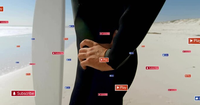 Holding surfer preparing adjusting black wetsuit zip by white board as UI labels appearing at beach