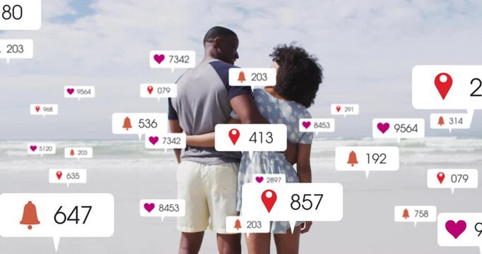 Couple facing sea alerts emerging heart or pin or bell icons covering torsos then fading for social 