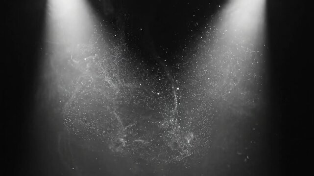 Abstract atmospheric background of light and particles with spotlights casting beams of luminance on swirling formations in darkness