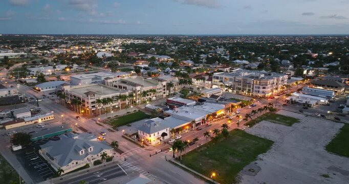 Historic town center of Punta Gorda, Florida with traditional buildings, shops and restaurants along a quiet street representing authentic small town America.