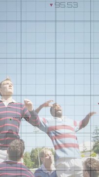 Lifting jumper in striped rugby jersey, team hoisting and catching ball on pitch, analytics overlay