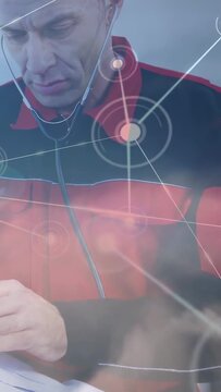 Vertical video: Male medic with steth