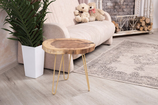 Natural wood table with epoxy resin in the interior