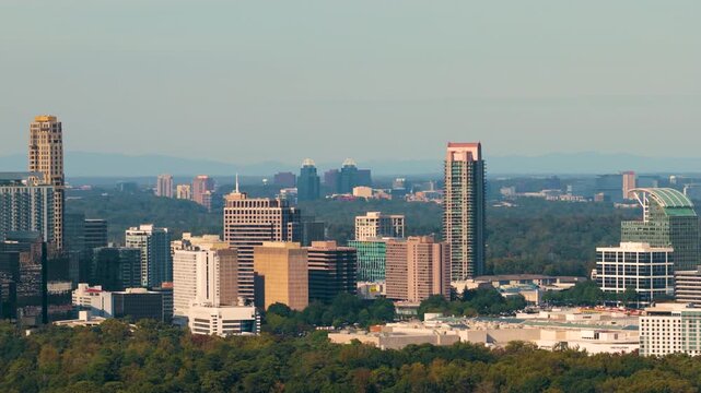 Urban Atlanta cityscape of Buckhead uptown with modern corporate and residential skyscraper buildings. Aerial view of big American city architecture.