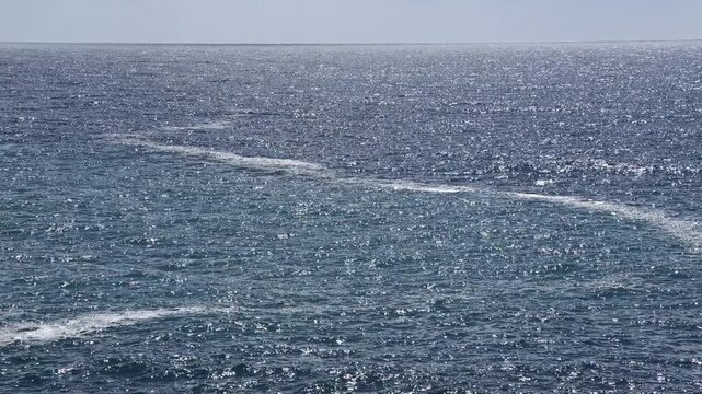 Large waves from Storm Therese impacting coastal area and shoreline infrastructure.