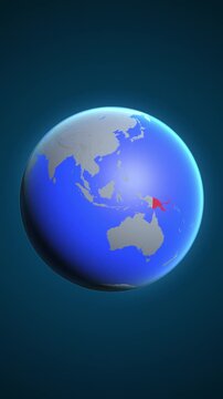 The animation shows a graphic representation of the earth and highlights the location and map of Papua New Guinea colored red in vertical format.