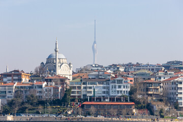 Obraz premium The futuristic Camlica TV Tower on the Asian side of Istanbul seen from Bosphorus