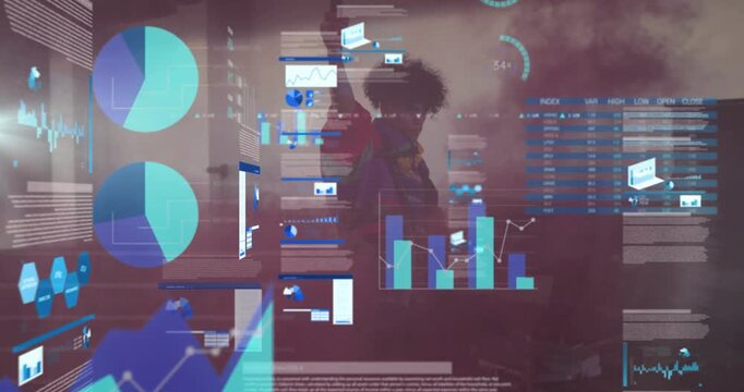 Walking man wearing colorful jacket pausing behind glass panel in studio, fixing hair with charts
