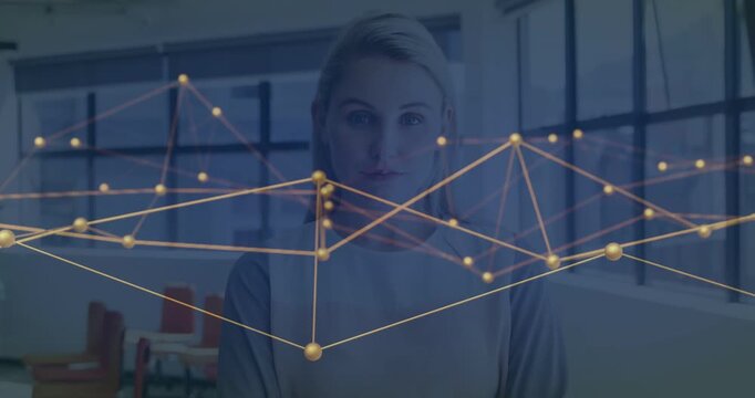 Vertical video: Sitting woman in lounge in light top, gold network starting over face showing data
