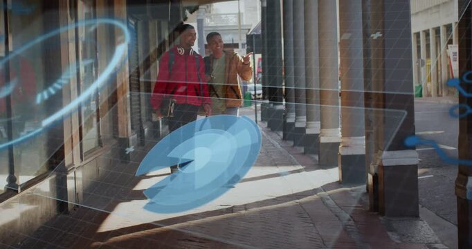 Man in tan raising smartphone and showing tech grid while two friends walking navigating arcade