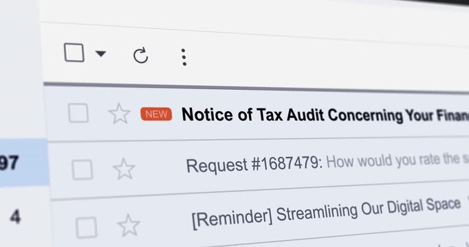 Incoming email with title Notice of Tax Audit Concerning Your Financial Records, new e-mail with tax audit confirmation, close up footage