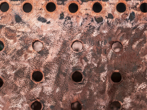 Detail einer Eisenplatte mit L&ouml;chern, Blick in die Brennkammer einer Dampflokomotive im Eisenbahnmuseum Darmstadt-Kranichstein