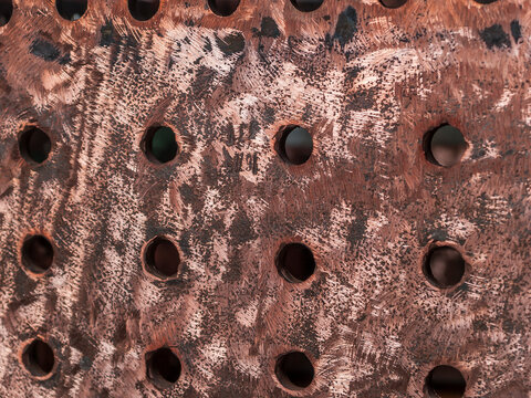 Detail einer Eisenplatte mit L&ouml;chern, Blick in die Brennkammer einer Dampflokomotive im Eisenbahnmuseum Darmstadt-Kranichstein