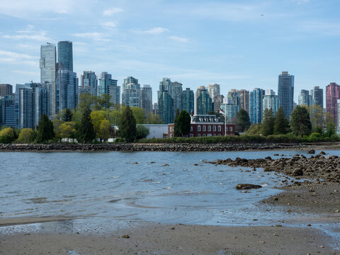 Scenic view of downtown Vancouver from Stanley park at low tide - British Columbia, Canada