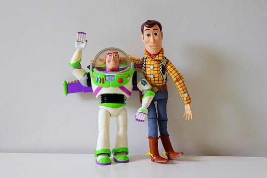 Salvador, Brazil - March 20, 2026: Woody and Buzz Lightyear action figures from Toy Story movie franchise on a white background.
