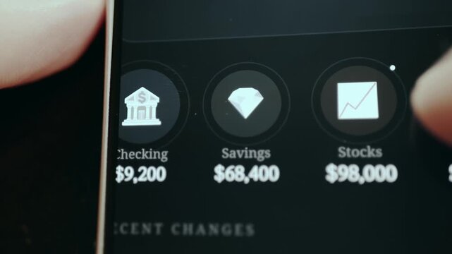 Person taps the Crypto category from a financial dashboard