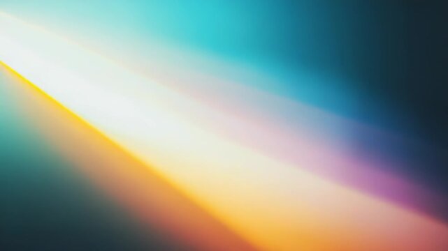 Abstract light rays forming a dynamic gradient of yellow, orange, and blue hues, creating a soft bokeh effect and smooth color transitions for a modern background