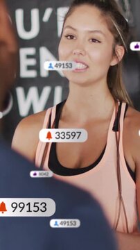Vertical video: Man asking question, woman explaining workout and gesturing, UI badges updating