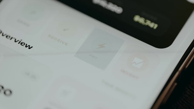 Person taps the PAY option within a banking application interface
