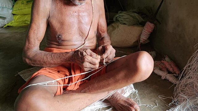 Elder Indian Brahmin Man Making Sacred Thread Janeyu, Traditional Yajnopavita Craft, Hindu Ritual Object Preparation, Cultural Heritage and Religious Practice Documentary 4K