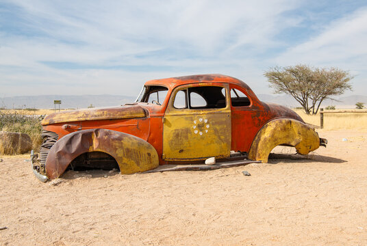 Wreck of Rusty car at the Solitaire Roadhouse, Khomas Region, Namibia, Africa
