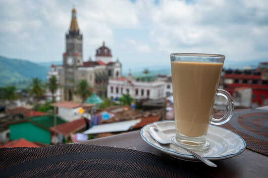 A cup of morning coffee in the magic town of Cuetzalan, Puebla, Mexico, landscape orientation