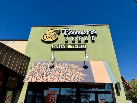 Panera Bread restaurant in the Arboretum Shopping Center in Charlotte, NC with copy space blue skies