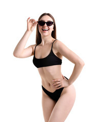 Beautiful young woman wearing stylish black bikini and sunglasses on white background