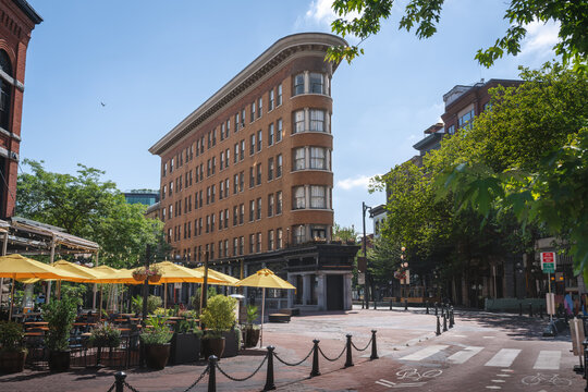 Maple Tree Square in Gastown historic neighborhood with flatiron building - Vancouver, British Columbia, Canada