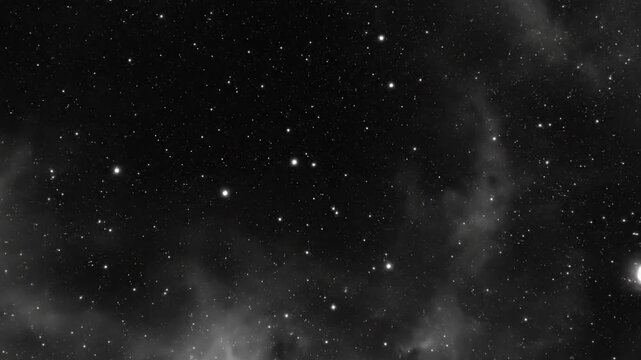 Black and white view of sparkling stars and nebulas floating in the vastness of deep space
