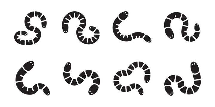 Collection of black earthworm silhouettes on white background, flat design vector illustration.