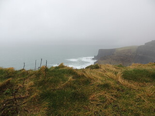 Fog on the coast - Cliffs of Moher  © Murilo