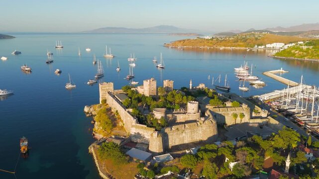 Bodrum, Turkey. Morning aerial view of Bodrum Castle overlooking yacht-filled marina and white houses, iconic Turkish Riviera landmark.. Aerial View
