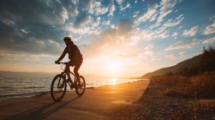 Obraz premium Scenic sunset bike ride along the waterfront with dramatic clouds and serene landscape view for adventure lovers and nature enthusiasts
