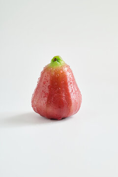 Commercial Photography of Fresh Red Wax Apples with Water Droplets on White Background