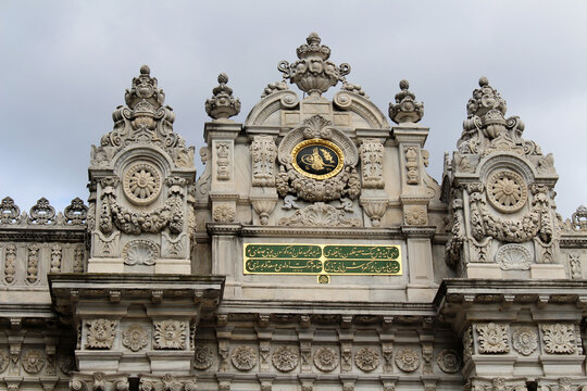 Dolmabahce Palace ornate gate facade September Summer 2024 Golden Ottoman tughra and calligraphy Istanbul