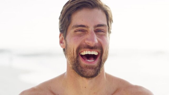Travel, face and man with laugh at beach for funny summer vacation, weekend getaway and humor. Space, tourist and happy at seaside for comic holiday adventure, ocean fresh air or tropical trip abroad