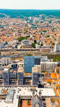 Vertical video. Nancy, France. Panorama of the central part of the city. Summer, Sunny day. Drone footage. Rich colors