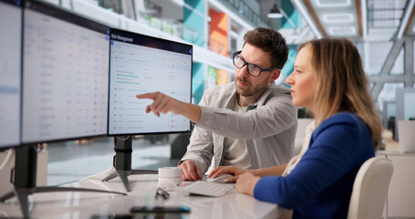 Cybersecurity Specialist Reviewing Data Breach Alerts © Andrey Popov