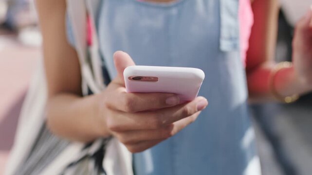 Hands, phone and scroll with texting in city with travel, bag and booking taxi on web for commute. Person, smartphone and click on mobile app, notification or social media with tourism in urban town