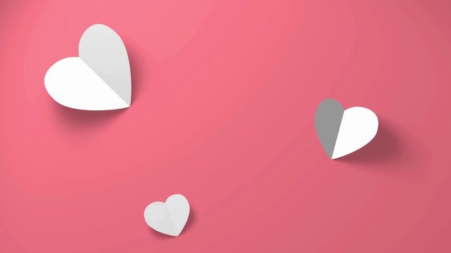 Three stylized white paper hearts with shadows arranged on a pink background