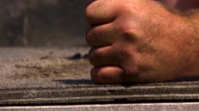 Close up of strong man hands grip strength
