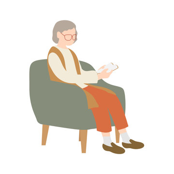 椅子に座って本を読むシニア女性 高齢者の読書シーン