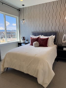 Bedroom with Scenic View and Accent Pillows