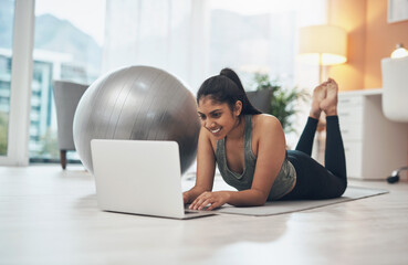 Smile, woman and laptop for yoga in home for fitness, online tutorial and streaming video. Female...